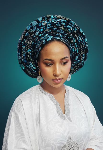 <a href="/collections/turbans-chapeaux" target="_blank" title="Turbans & Chapeaux"><strong>Grand Chapeau Nigérian Gélé</strong> -      Découvrez la collection. </a>